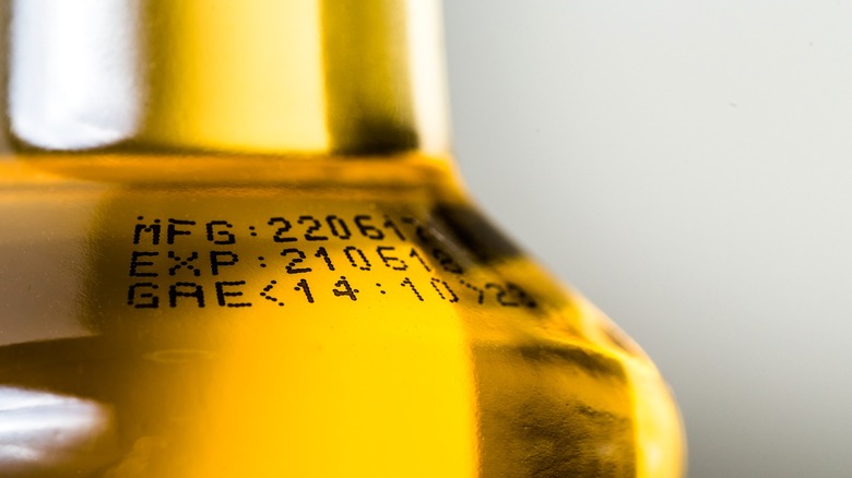 Close up best by date on beer bottle