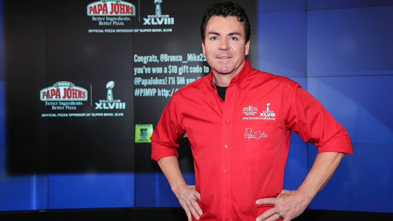 John Schnatter with hands on hips