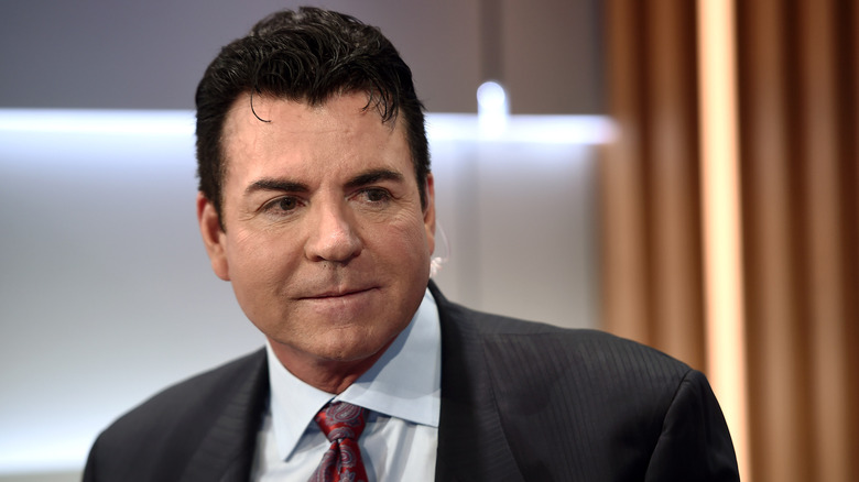 John Schnatter in a suit