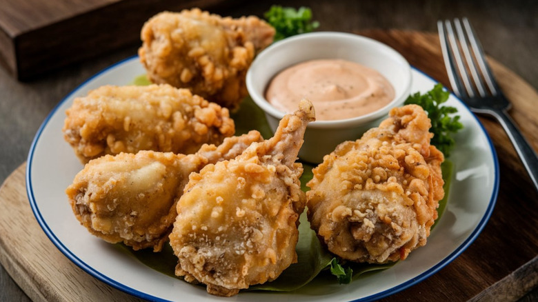 Fried Rocky Mountain oysters with dipping sauce