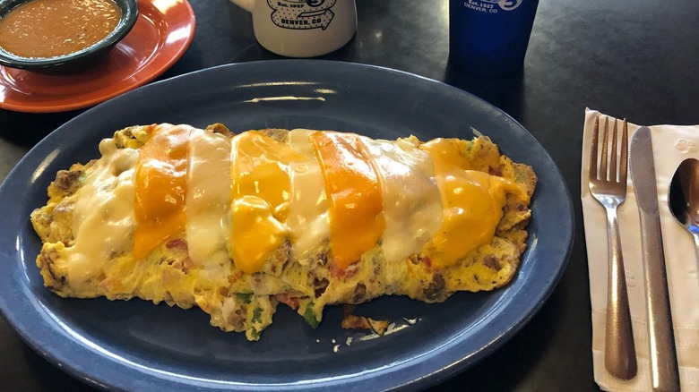 "Momma's Big Fat" Omelet from Sam's No. 3 on a blue platter