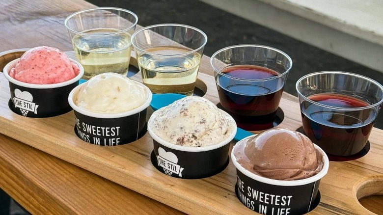 ice cream and wine flight with four cups of ice cream, two cups of white wine, and two cups of red wine