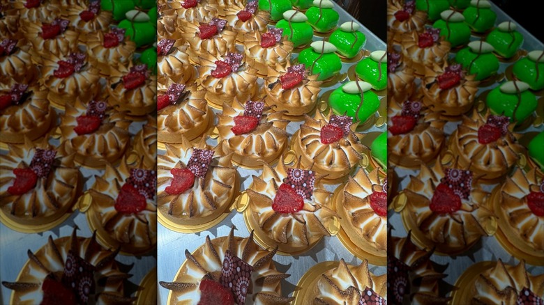 Elaborate cakes in display case