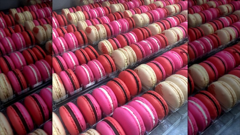 Pink, red, and cream macarons