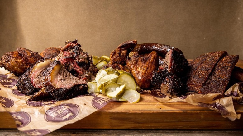 Barbecue meat spread on board