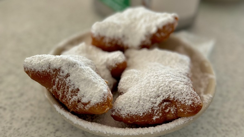 A plate of beignets from Cafe du Monde