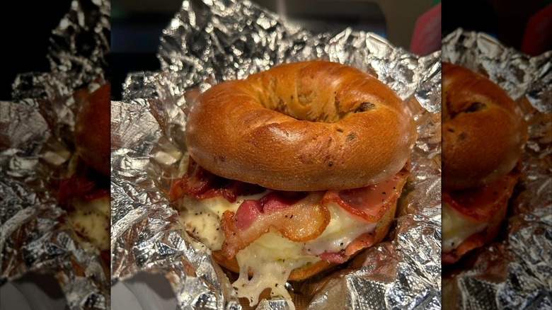 A breakfast bagel sandwich in aluminum foil