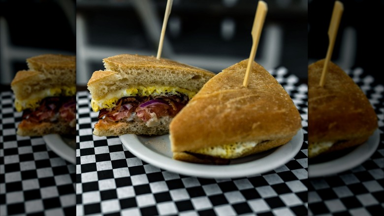 A packed breakfast sandwich on focaccia bread