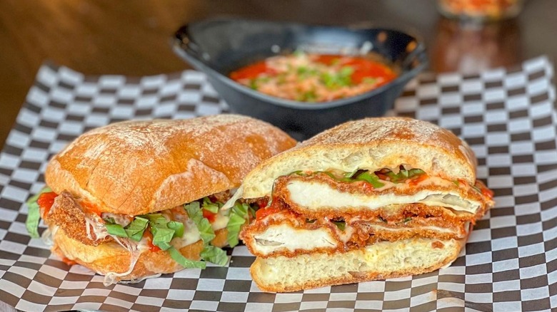 Chicken Parmesan sandwich sliced in half