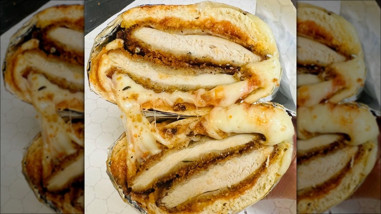 Chicken Parmesan sandwich sliced in half
