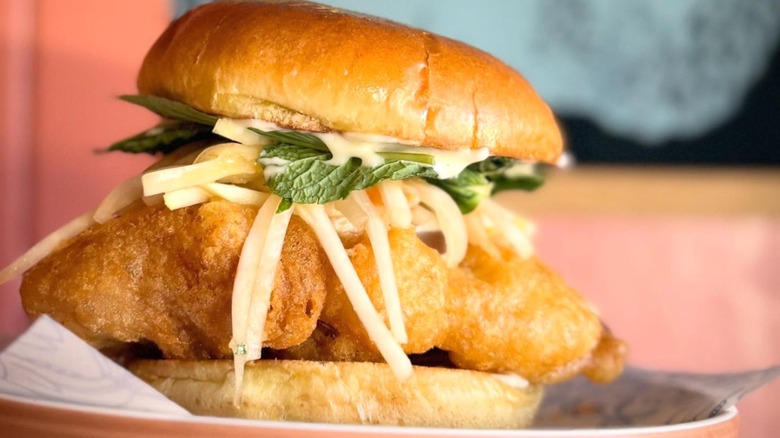 Lil Chippy Fish Buddy sandwich on a white plate