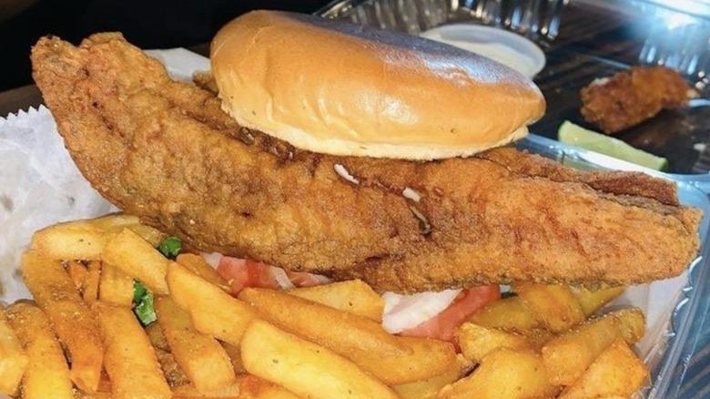 Sal and Sons Fish Market Catfish Sandwich with fries on butcher paper