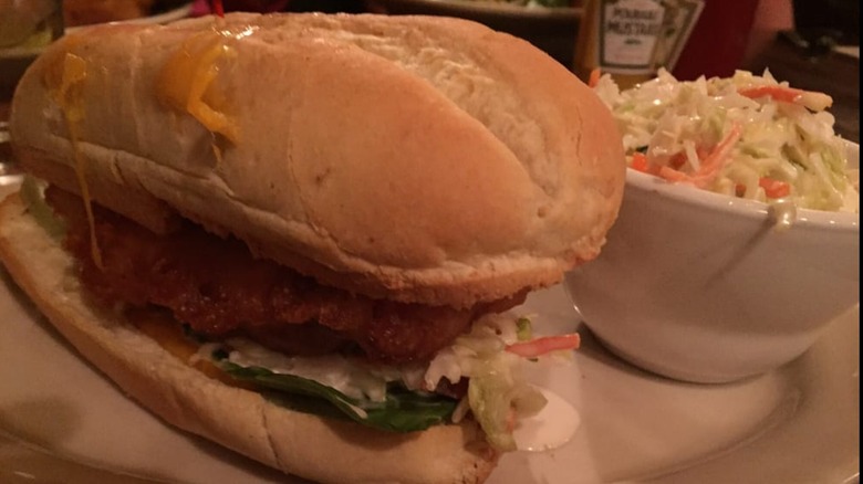 Brazen Head Irish Pub Dinglebay Fish Sandwich with side of slaw on a white plate