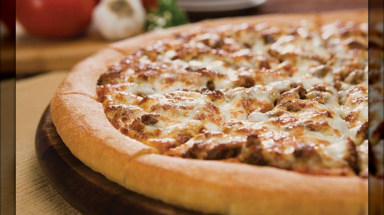 A Love's pizza sits on a table