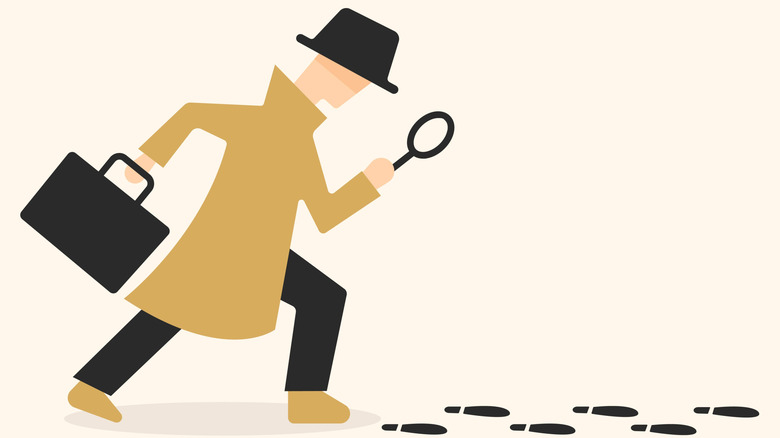 Cartoon of a detective with a magnifying glass following a trail of footsteps