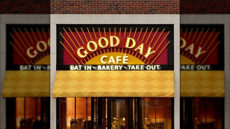 Good Day Cafe Exterior with yellow awning under signage