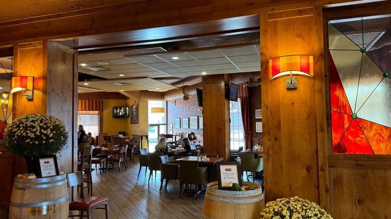 Grille 26 by Minervas interior dining room with people dining