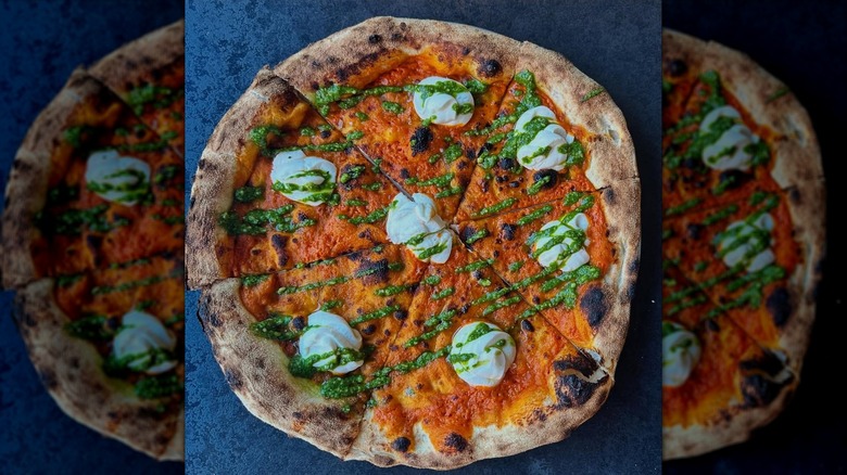 Pizza with pesto sauce