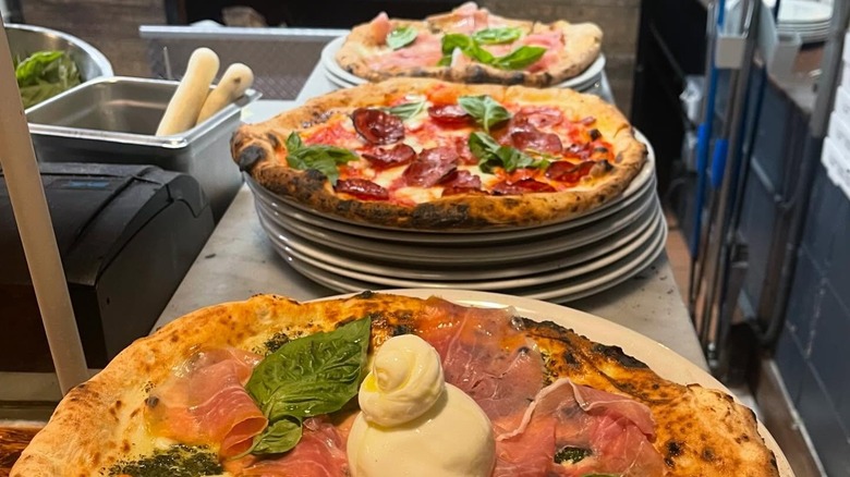 Three pizzas in a row