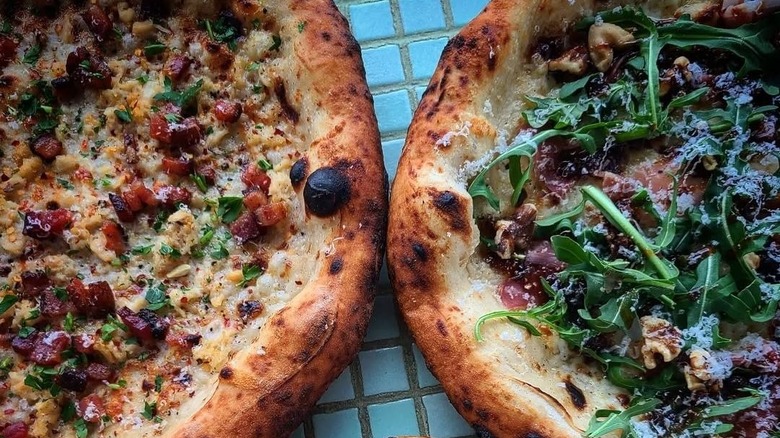 Two pizzas side-by-side