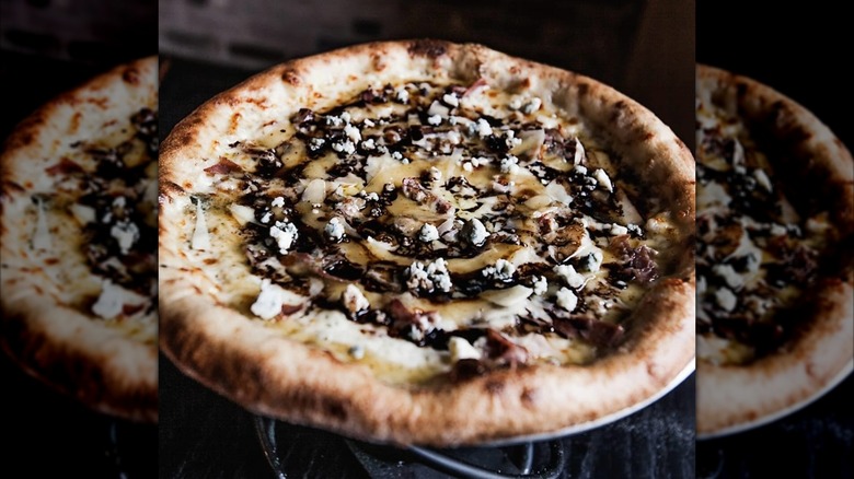 Creamy sauce on top of pizza