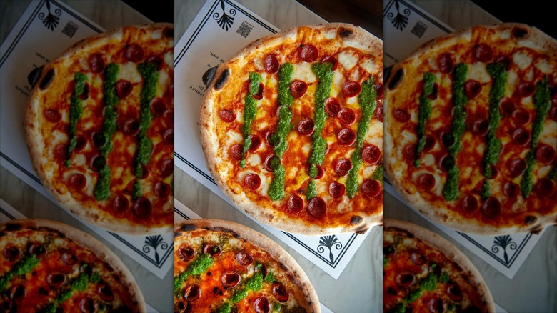 Pizzas with pesto sauce