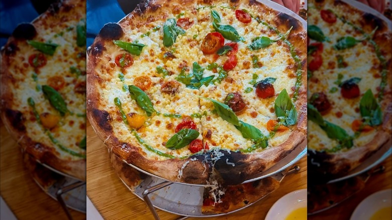 Pizzas on stand