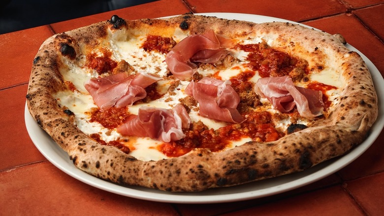 White pie with prosciutto