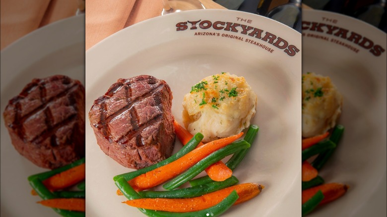 The Stockyards Steakhouse filet mignon with mashed potatoes and veggie sides