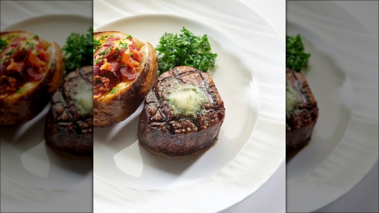 The Peppertree's filet mignon with a side of loaded baked potato