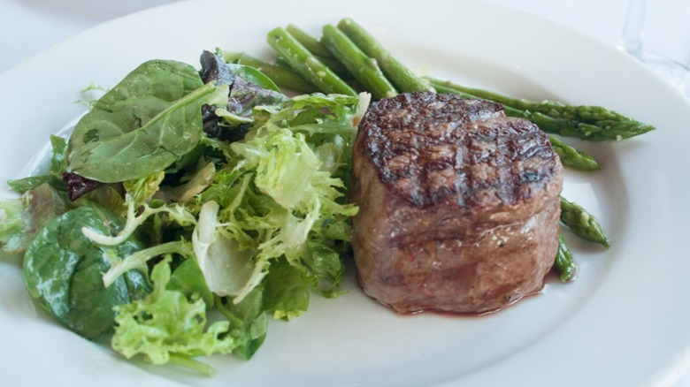 Metro 8 filet mignon with salad and asparagus