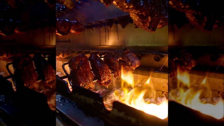 Rioz Brazilian Steakhouse filet mignons grilling on open flame