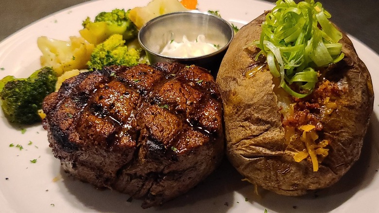 Melrose Grill filet mignon with broccoli and loaded baked potato