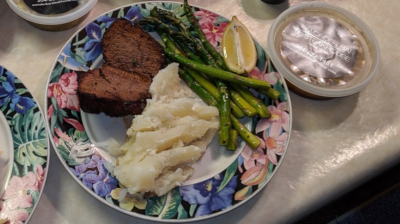 The Wonder Bar filet mignon with asparagus and potato on side