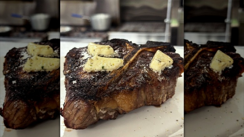 Steak with butter on plate at Stalk Steakhouse