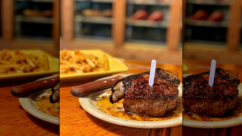 Steak with plastic indicator on plate at Taylor's Steakhouse