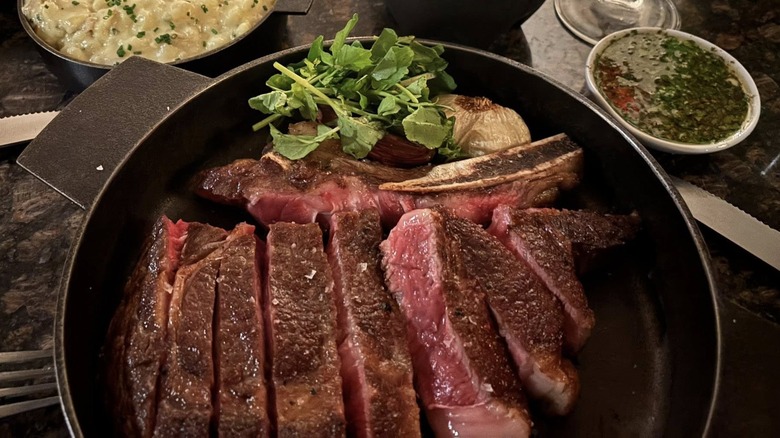 close-up of a table full of steak and sides at Thames Street Kitchen
