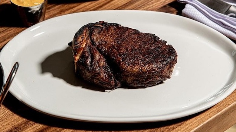 steak on plate at Marbled and Fin