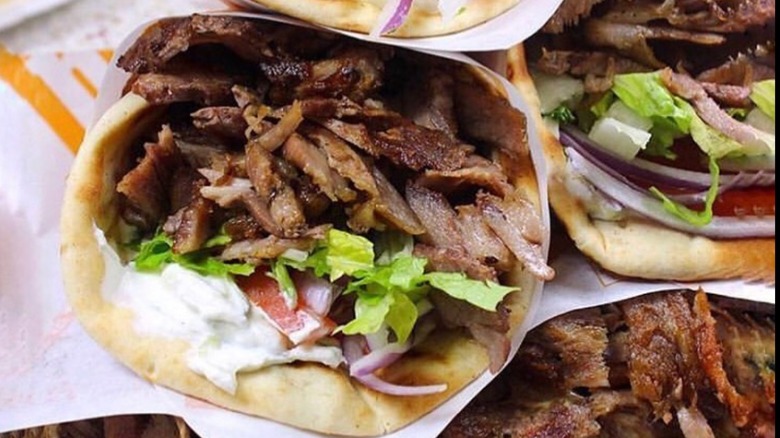 Multiple gyros stacked in a pile from BZ Grill