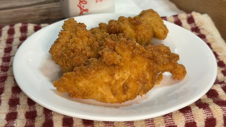 Chick-fil-A tenders on a white plate