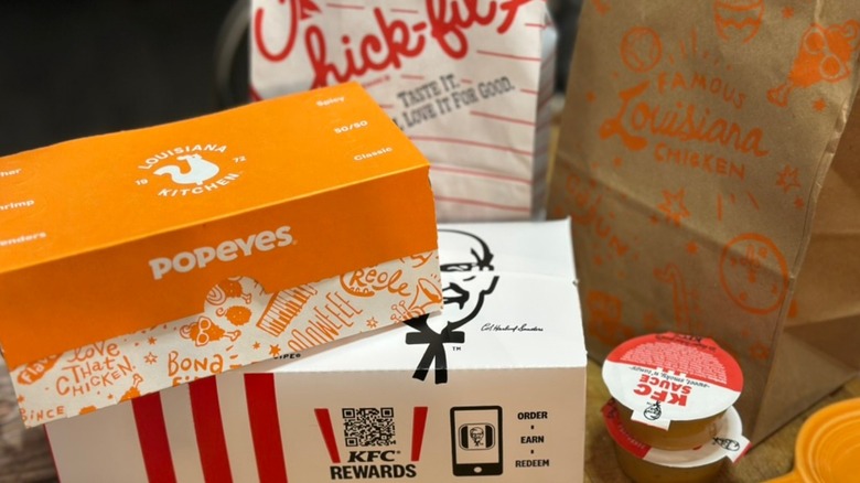 KFC, Chick-fil-A & Popeyes boxes and sauces