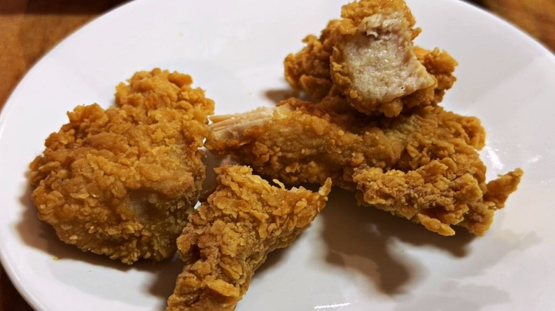 Chick-fil-A tenders cut open on a white plate