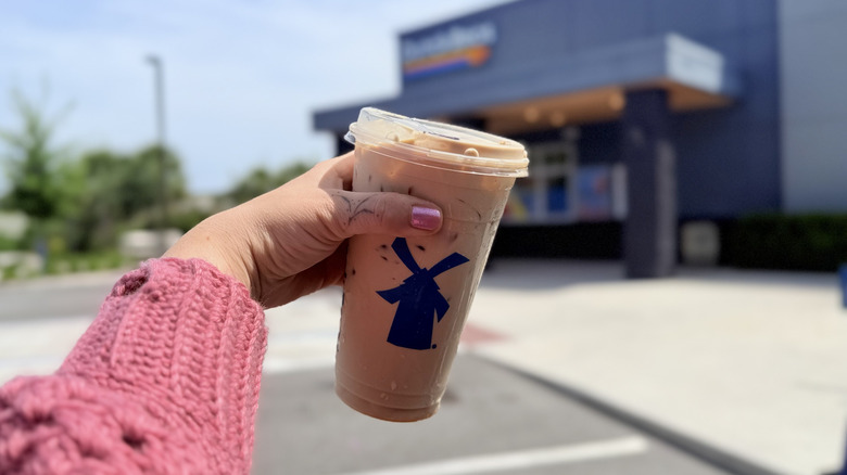 Holding a Golden Eagle in a to-go cup from Dutch Bros