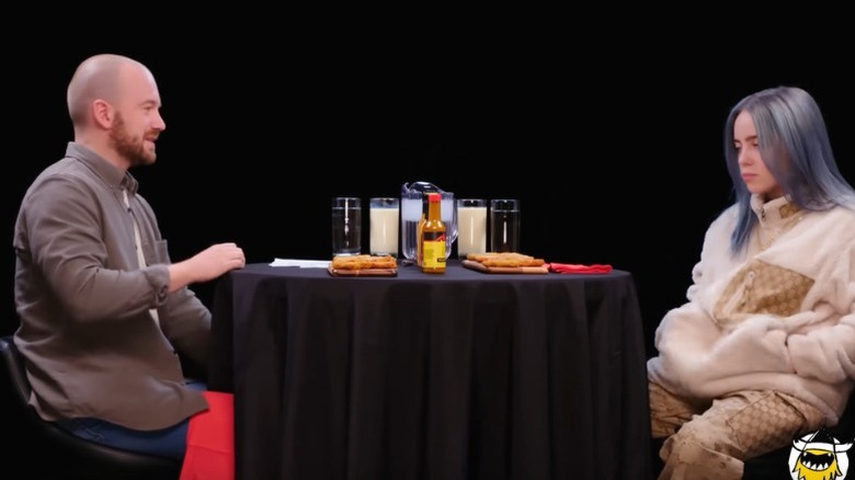 Sean Evans interviewing Billie Eilish on "Hot Ones."