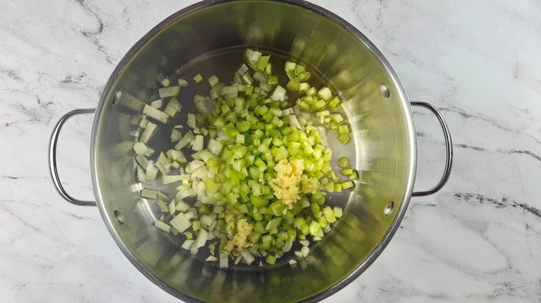 chopped raw vegetables in a metal pot
