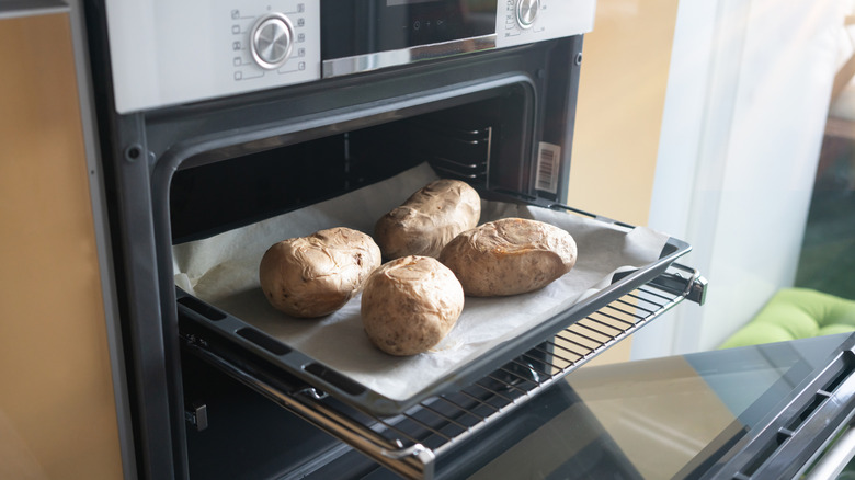 Baked potatoes about to cook