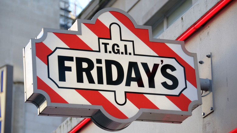 a sign outside a TGI Fridays restaurant