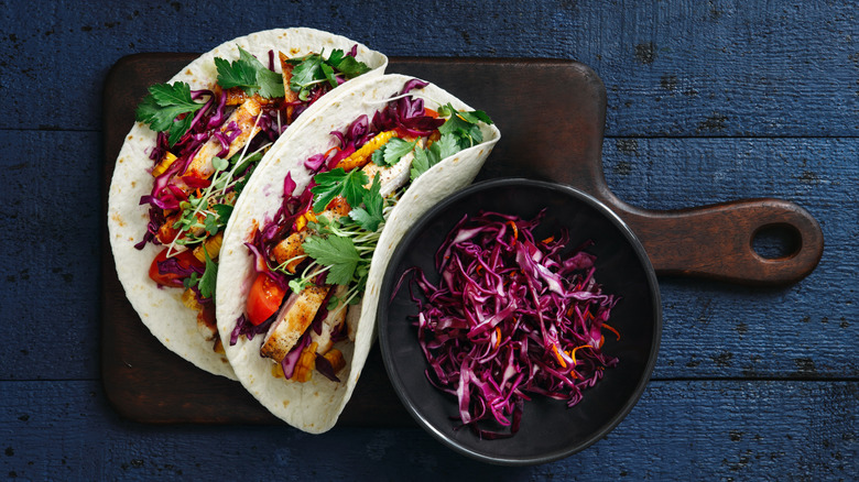 Grilled chicken tacos with red cabbage coleslaw