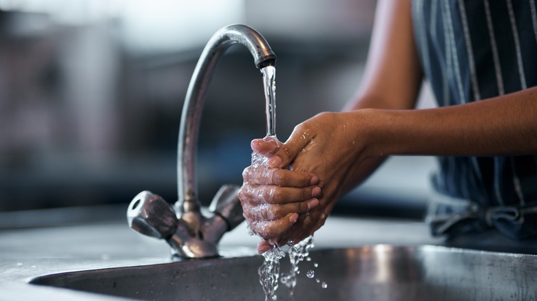 Person washing their hands