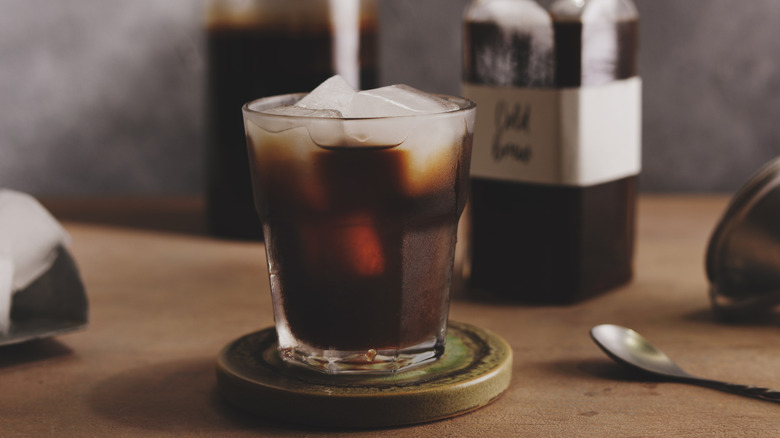 A glass of homemade cold brew coffee concentrate with ice